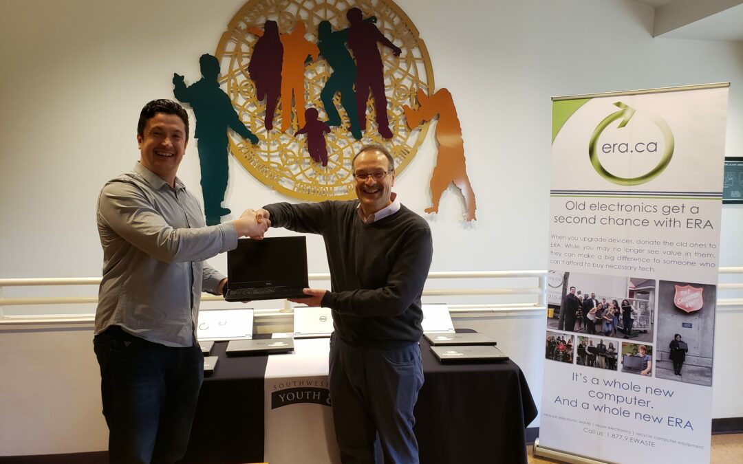 ERA Donate 20 Laptops to SWYFS in the Seattle Area